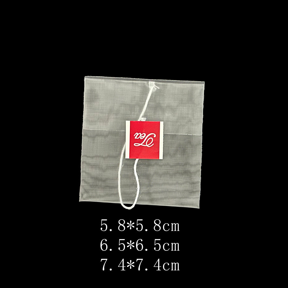 Empty Nylon disposable reverse-fold teabag with string and tag